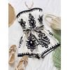 image:imageFloerns Womens Boho Floral Strapless Jumpsuit Sleeveless Vacation Short Belted RomperBlack and White
