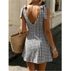 image:imageFloerns Women Summer Gingham Backless Bow Tie Casual Vacation Mini DressesBlack White Plaid