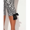 image:imageFloerns Womens Plus Size Leopard Stretchy Capri Pants Y2k High Waisted Bow Side Skinny Capri LeggingsBlack and White
